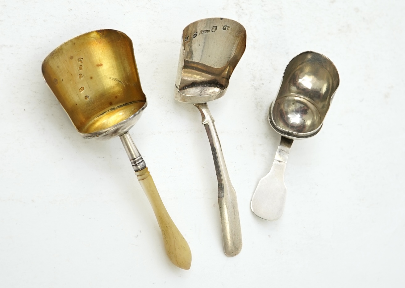 Seven assorted 19th and 20th century silver caddy spoons